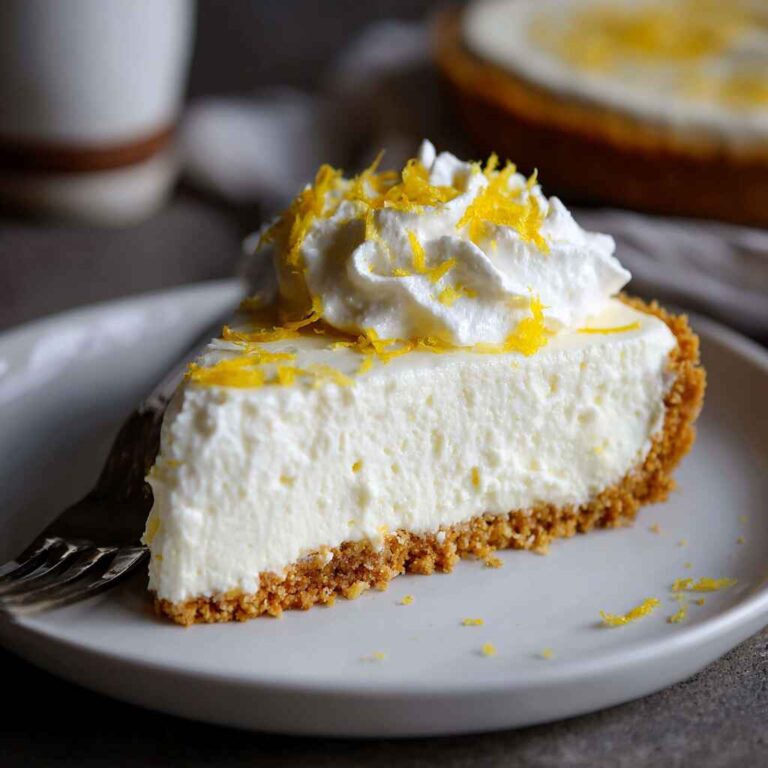 A slice of keto no bake lemon cheesecake on a dessert plate