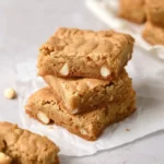 Delicious blondies baked to perfection, showcasing a golden, chewy texture.