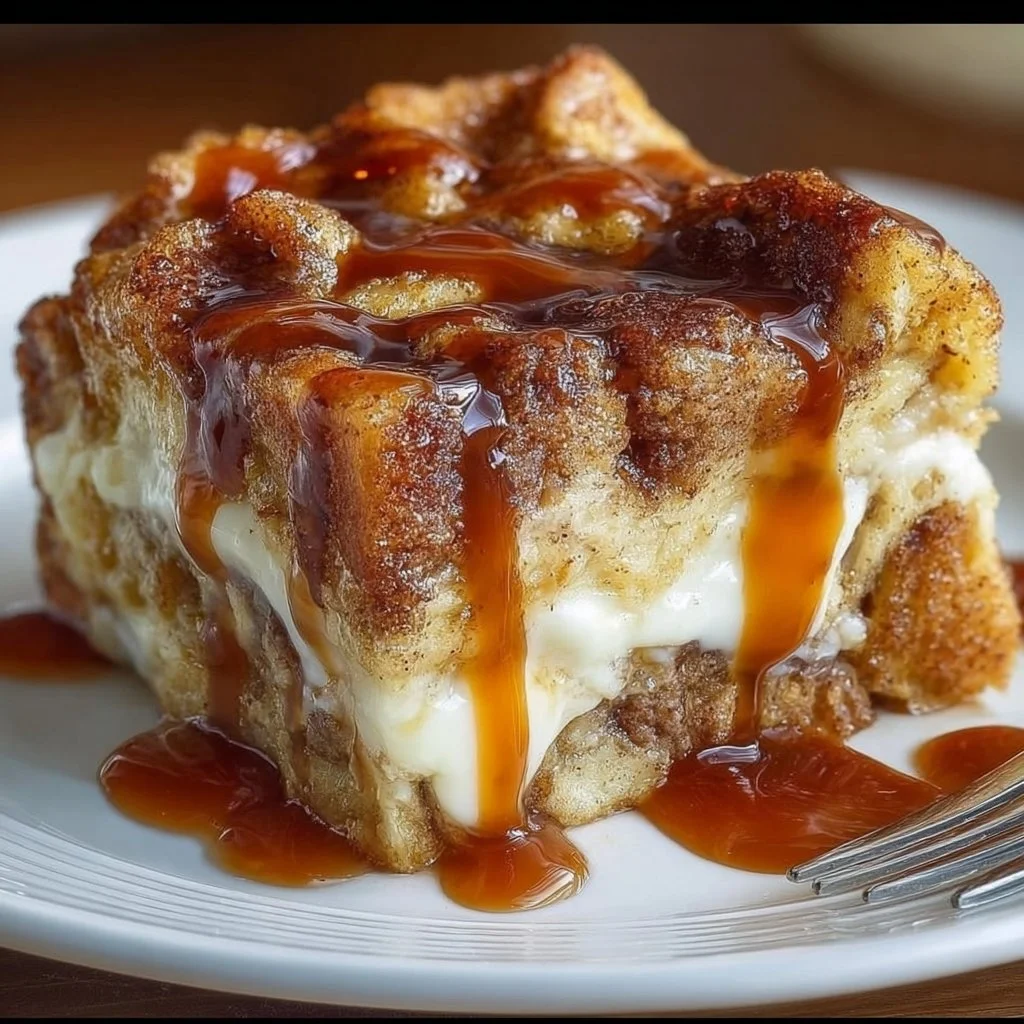 Cinnamon Toast Bread Pudding drizzled with caramel sauce, a delicious dessert.