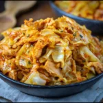 Sauteed chicken with cabbage dish, ready to serve with vibrant ingredients.