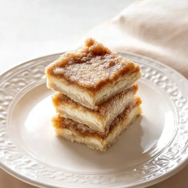 Delicious Sopapilla Cheesecake with a golden crust and creamy filling