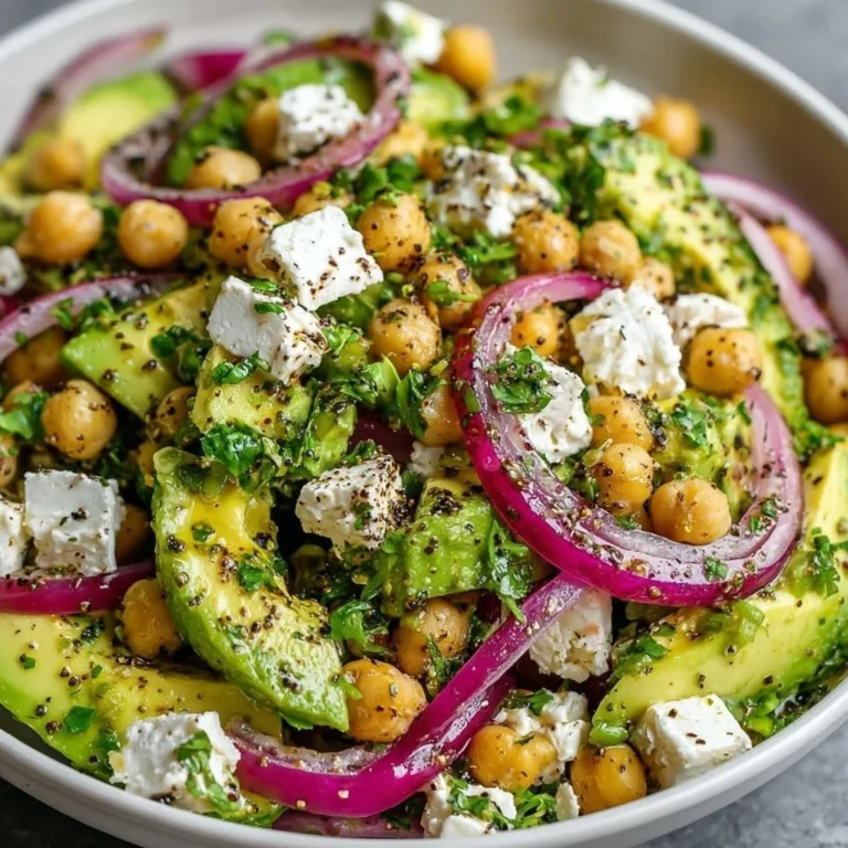 Chickpea Feta Avocado Salad with fresh ingredients in a bowl.
