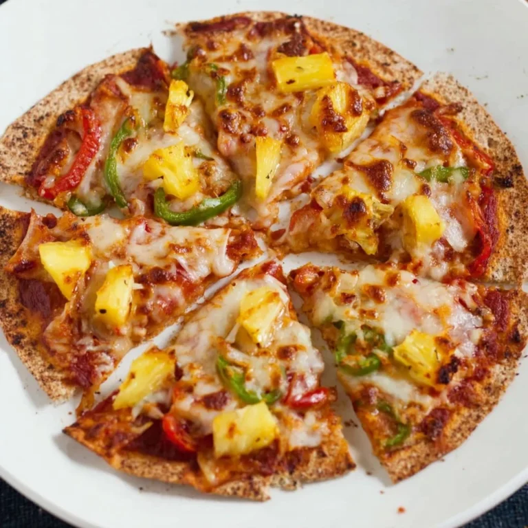 Delicious homemade tortilla pizzas topped with fresh ingredients on a plate