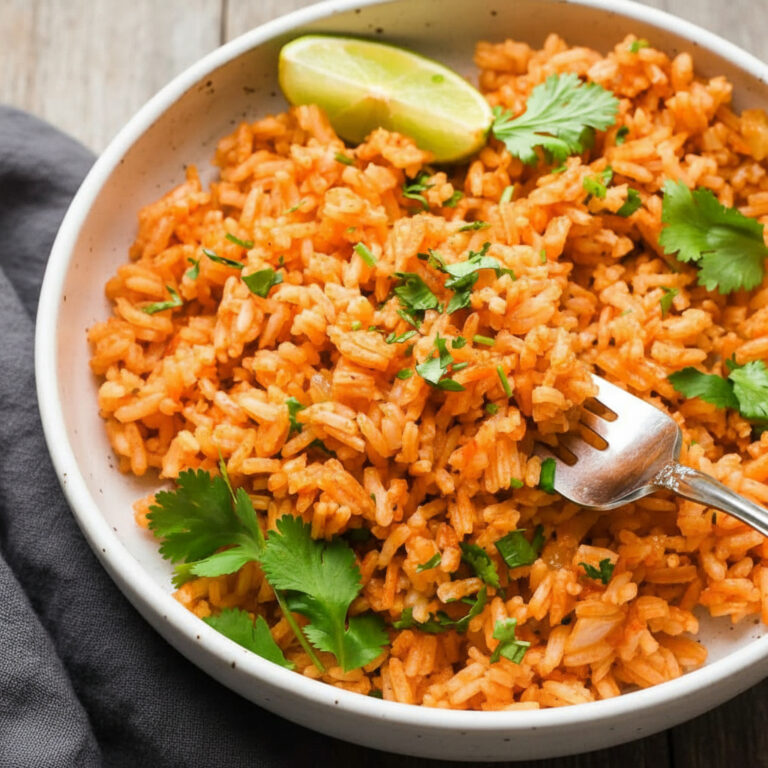 Bowl of Easy Mexican Rice garnished with fresh cilantro