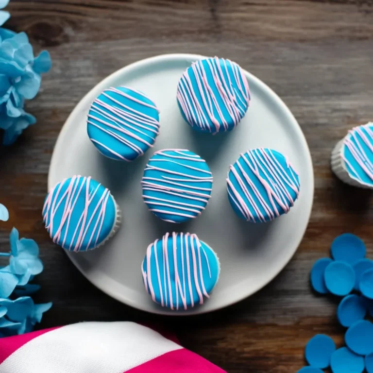 Delicious blue cake pops on a decorative platter for every celebration.