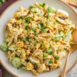 Delicious Curry Chicken Salad served in a bowl with fresh ingredients