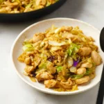 Quick and flavorful chicken stir-fry with cabbage on a plate
