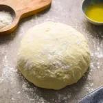 Freshly made homemade pizza dough ready for toppings