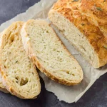 Freshly baked Rosemary Cheese Bread with herbs and melted cheese