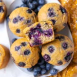 Healthy blueberry protein muffins on a wooden table