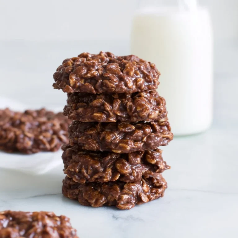 A plate of delicious no bake cookies topped with chocolate and nuts.