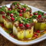 Elegant stuffed leeks filled with beef, a delicious family recipe.