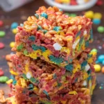 Colorful Fruity Pebble Krispie Treats on a plate