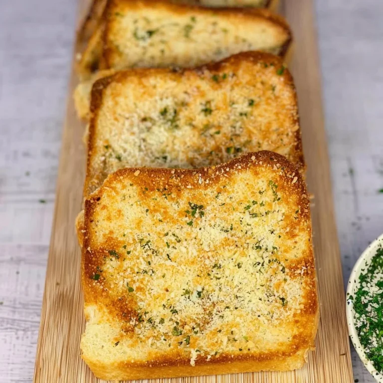 Delicious homemade Texas Toast served on a wooden table.