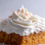 Delicious marshmallow buttercream frosting topped on a cake