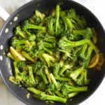 Plate of flavorful sautéed broccoli showcasing vibrant colors and fresh ingredients