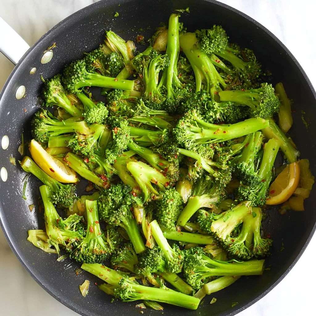Plate of flavorful sautéed broccoli showcasing vibrant colors and fresh ingredients