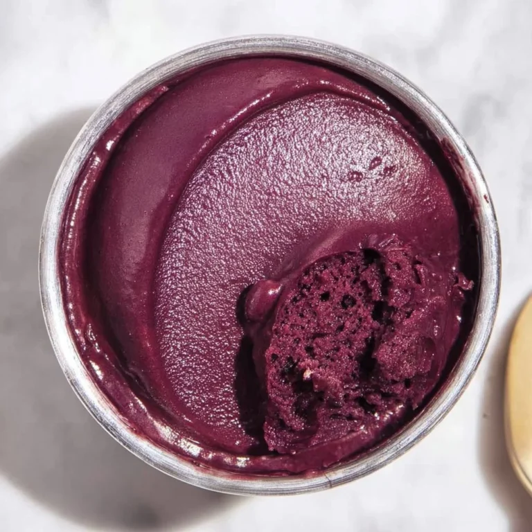 Ninja Creami acai bowl topped with fruits and granola