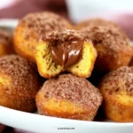 Nutella churro donut poppers dusted with cinnamon sugar