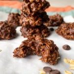 Delicious dairy-free protein no bake cookies stacked on a plate.