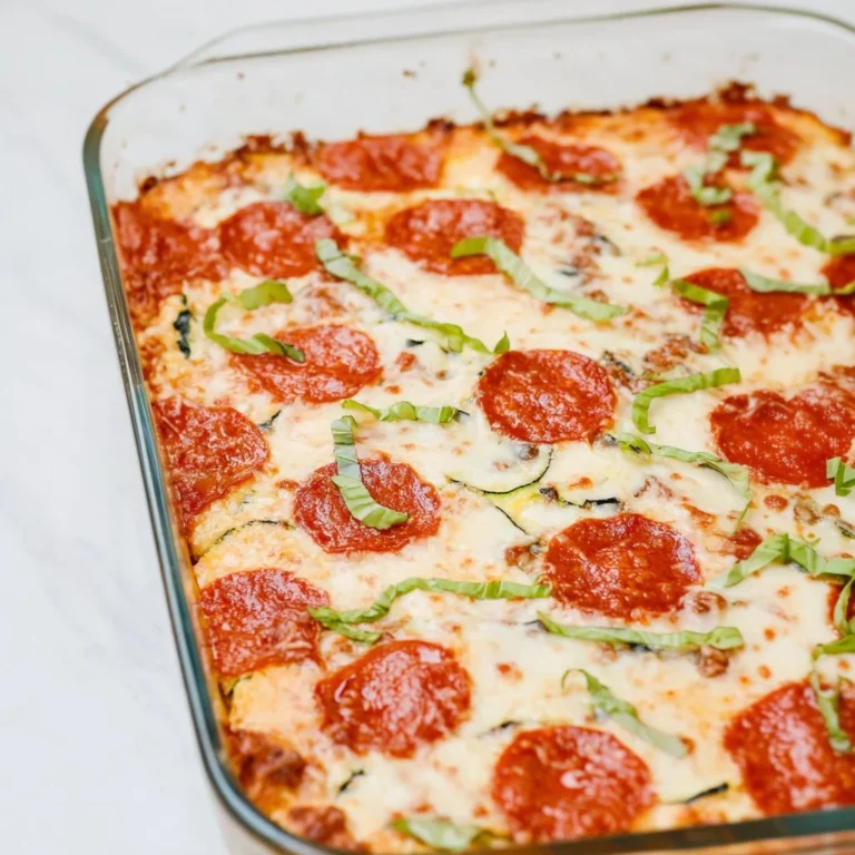 Baked Zucchini Pizza Casserole topped with cheese and pepperoni