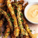 Crispy air fryer asparagus fries served in a bowl