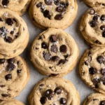 Freshly baked air fryer chocolate chip cookies on a cooling rack