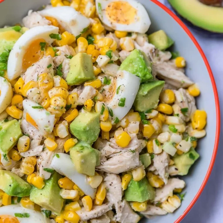 Delicious Chicken Avocado and Corn Salad served in a bowl