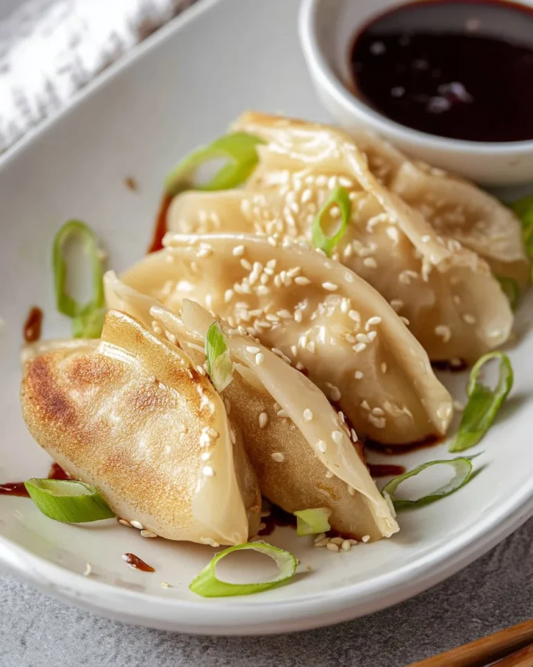 Delicious homemade Chicken Potstickers served with a dipping sauce