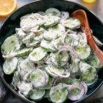 Creamy cucumber salad with Greek yogurt dressing in a bowl