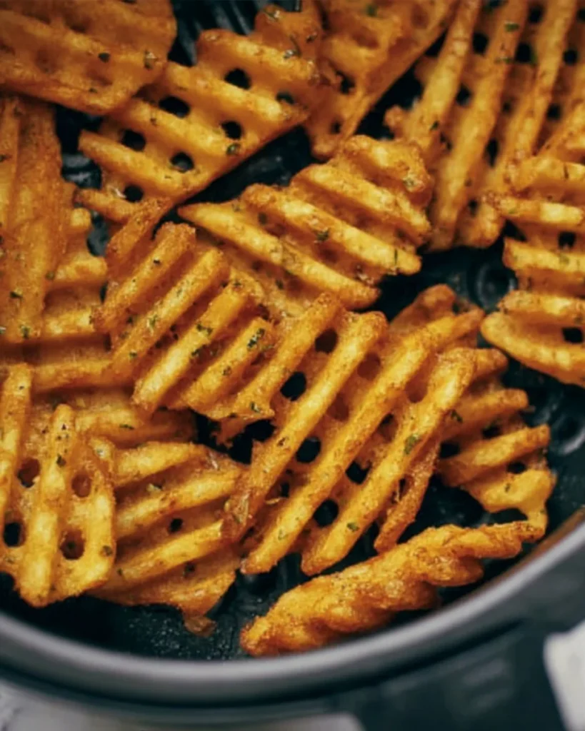 Crispy air fryer frozen waffle fries served as a quick comfort snack