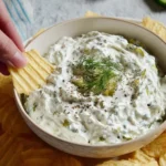 Creamy Dill Pickle Dip served with chips and veggies