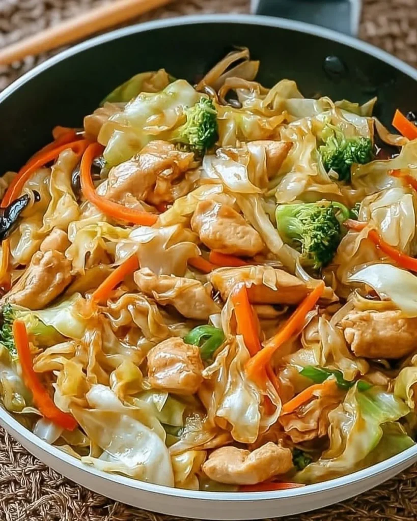 Flavorful cabbage stir fry with chicken served in a bowl