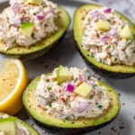 Healthy chicken salad stuffed in avocado halves for a nutritious meal