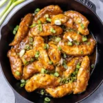 Honey Garlic Chicken Tenderloin served with vegetables on a plate