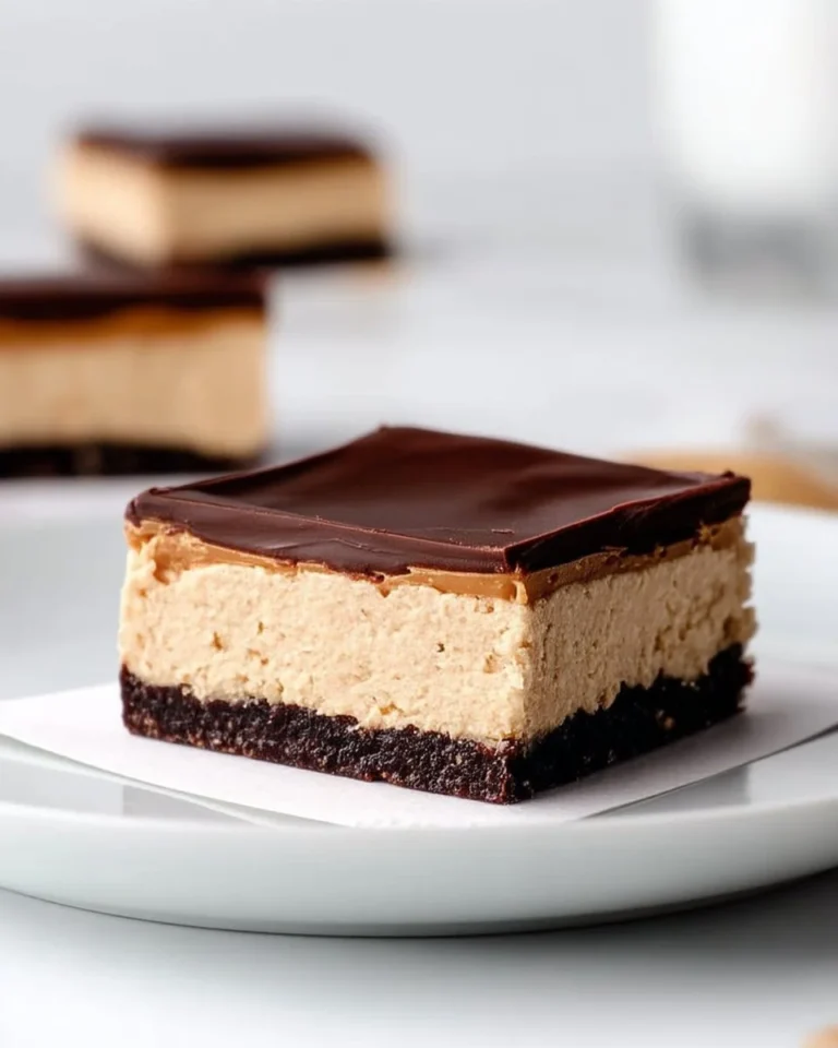 Low Carb No-Bake Peanut Butter Pie Bars topped with chocolate and peanuts