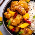 Mango Chicken dish featuring tender chicken and fresh mango slices