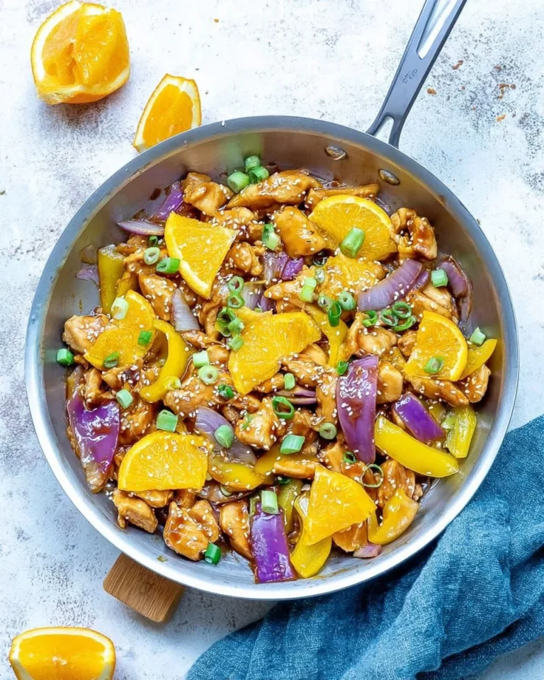 Delicious Orange Chicken stir-fry with colorful vegetables and savory sauce