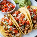 Delicious chicken street tacos topped with fresh ingredients and vibrant flavors.