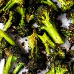 Bowl of perfectly roasted broccoli with olive oil and spices