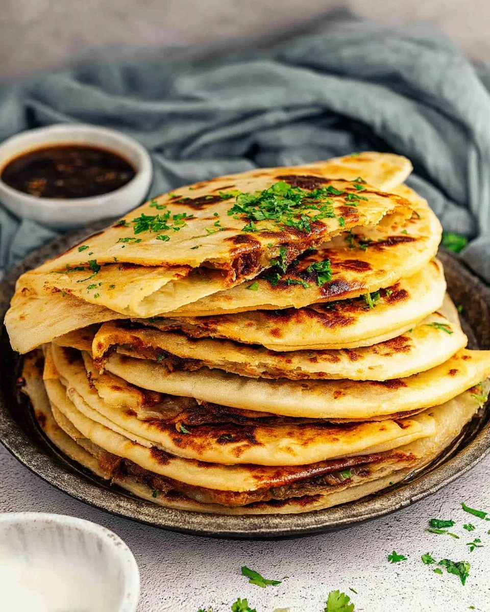 Delicious Smashed Dumpling Tacos served with fresh toppings