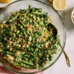 Colorful Spring Quinoa Salad with asparagus and peas in a bowl