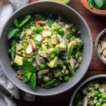 Spring Quinoa Salad with Honey Lemon Vinaigrette garnished with fresh vegetables