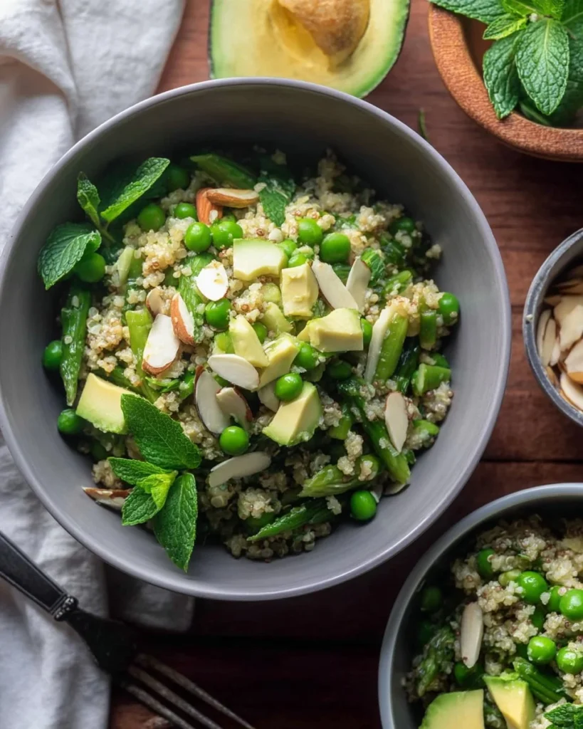 Spring Quinoa Salad with Honey Lemon Vinaigrette garnished with fresh vegetables