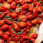 Delicious roasted cherry tomatoes served as a vibrant side dish.