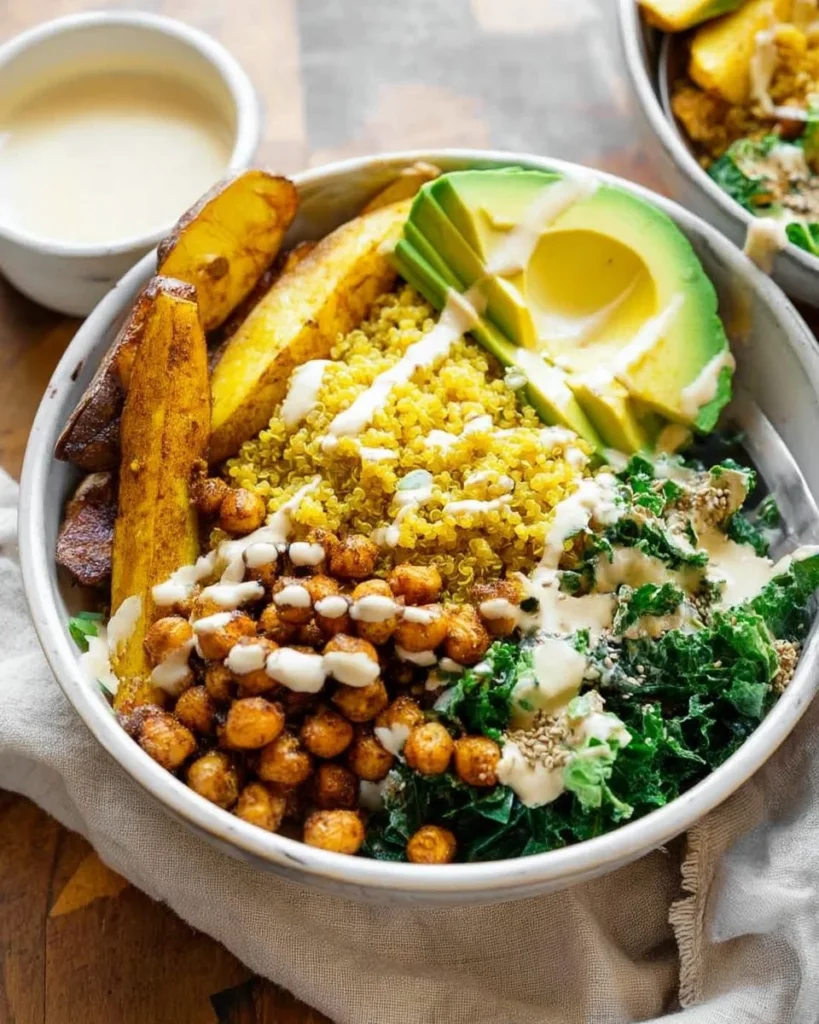 Vegan turmeric quinoa power bowl with colorful vegetables and spices