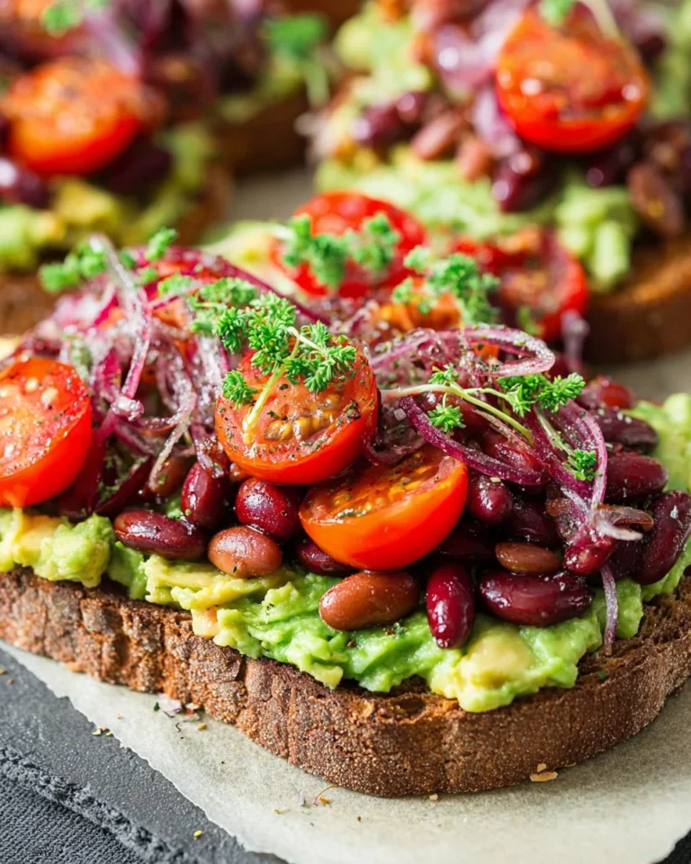 Delicious veggie and bean toast garnished with fresh vegetables