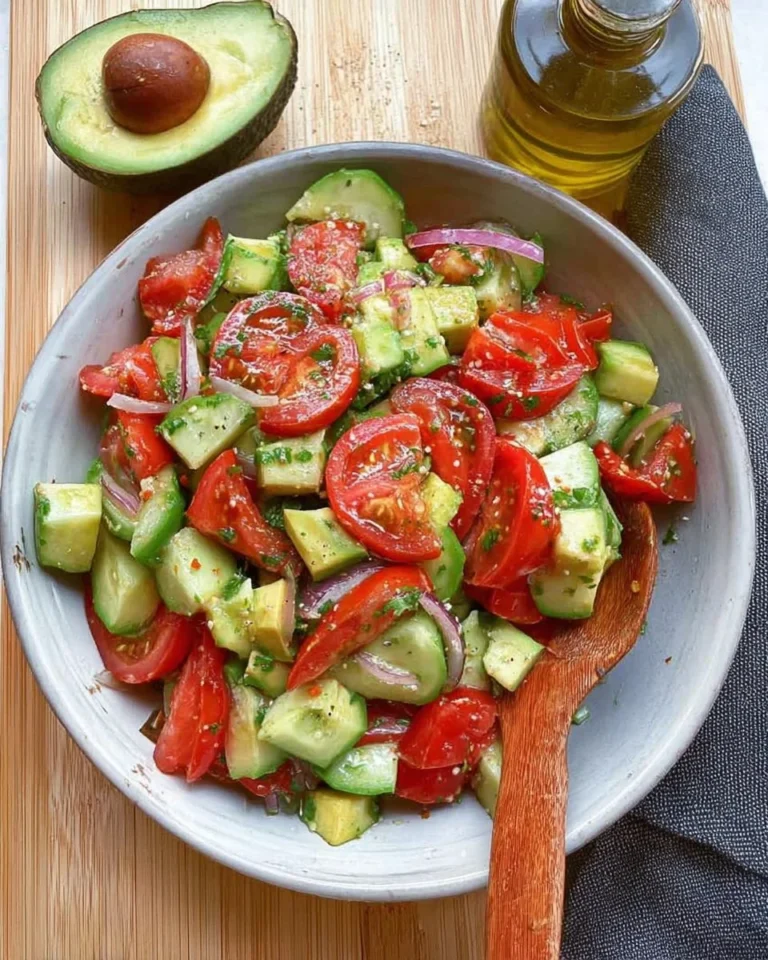 Delicious Avocado Tomato Salad with creamy dressing, perfect for a healthy family meal.