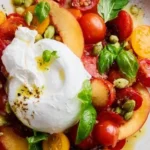 Delicious Burrata cheese served with fresh basil and tomatoes