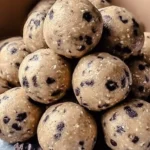 Homemade cookie dough protein balls with chocolate chips and nuts